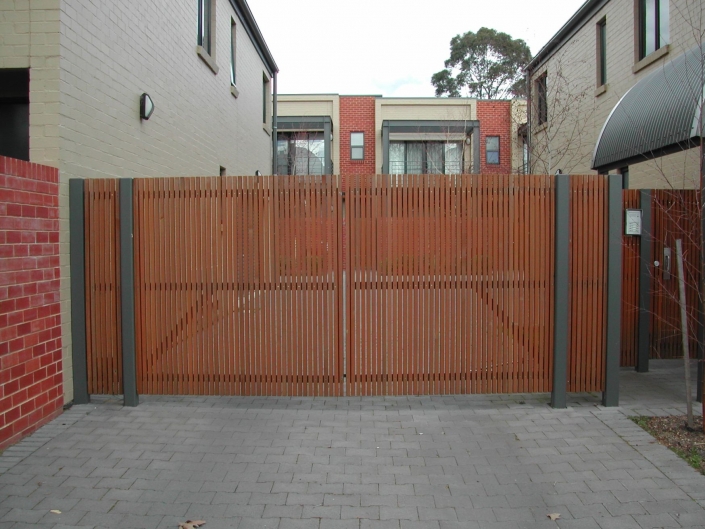 Wooden gates with gaps